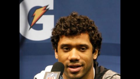 Seattle Seahawks quarterback Russel Wilson talking with the media