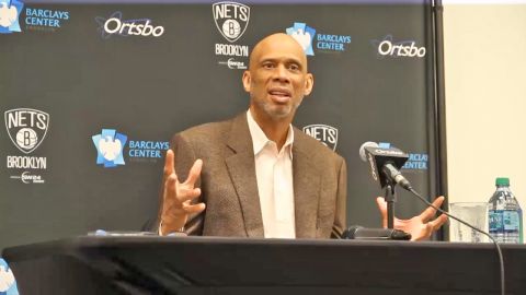 Basketball great, Kareem Abdul Jabbar, speaking to the media