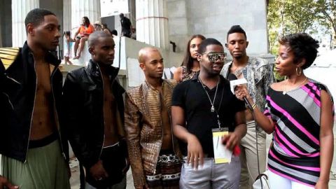 What's The 411 correspondent Kizzy Cox interviewing fashion designer Austin Paul of Austin Paul New York at the 2011 Harlem Week Urban Fashion Show