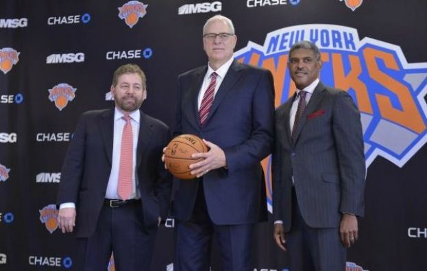 James Dolan, Chairman, Madison Square Garden (l) and Knicks General Manager Steve Mills (r) introduce Phil Jackson as President of the New York Knicks to media at a press conference at Madison Square Garden