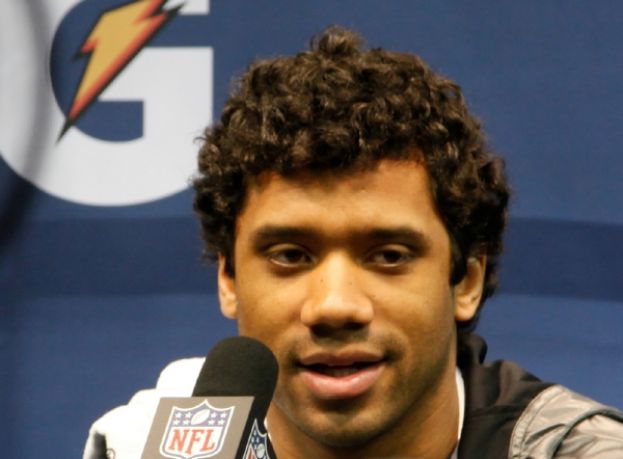 Seattle Seahawks Super Bowl winning quarterback, Russell Wilson, talking with the media