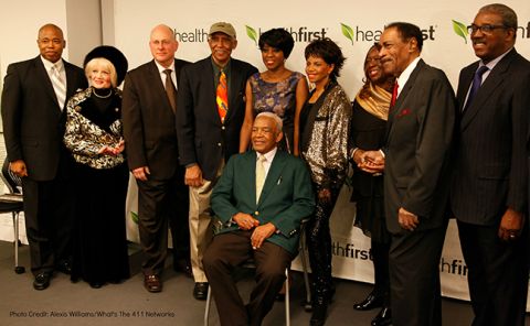 Irving Burgie aka Lord Burgess, songwriter of the song, Day O, made famous by Harry Belafonte is seated and behind him are (left to right) Brooklyn Borough President, Eric Adams; Mark Jaffee, President & CEO of the Greater New York Chamber of Commerce; Dr. Gerald Deas, leading internist in the area of preventive health; NY1 News anchor Cheryl Wills; singer/actress Melba Moore; Barbara Askins, President and CEO of the 125th Street Business Improvement District in Upper Manhattan (NYC); former Fox 5-TV journalist, Bill McCreary, and; entrepreneur, author, and former corporate executive, Frank Savage